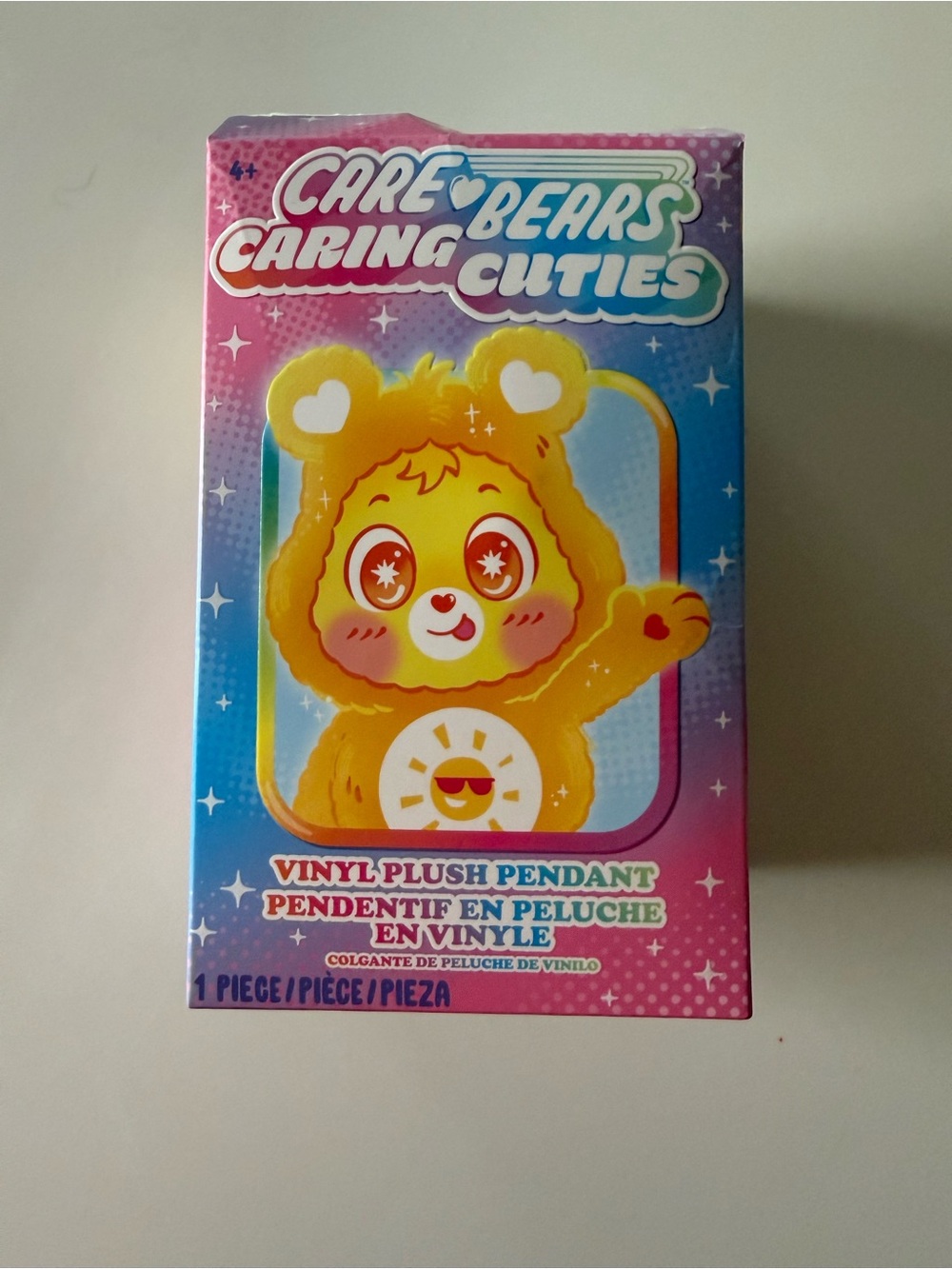 Care Bears Caring Cuties Yellow Vinyl Face Pendant